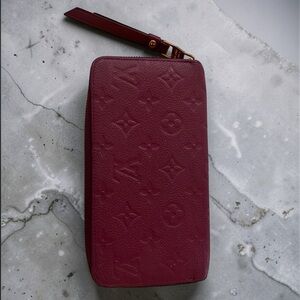 Louis Vuitton Monogram Empreinte Zippy Wallet Purple